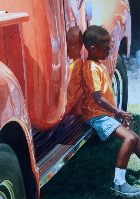 Kid on running board of vintage orange truck