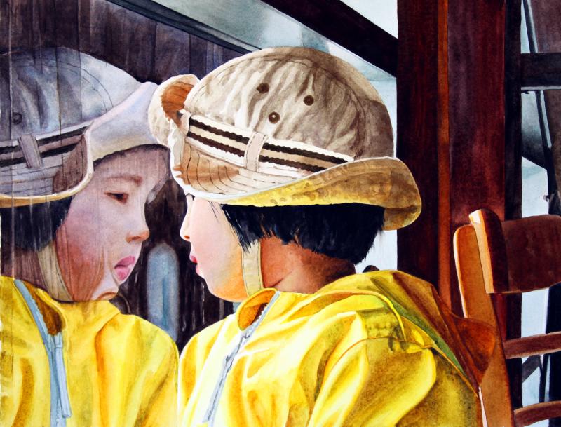 Reflection of child in rainy window
